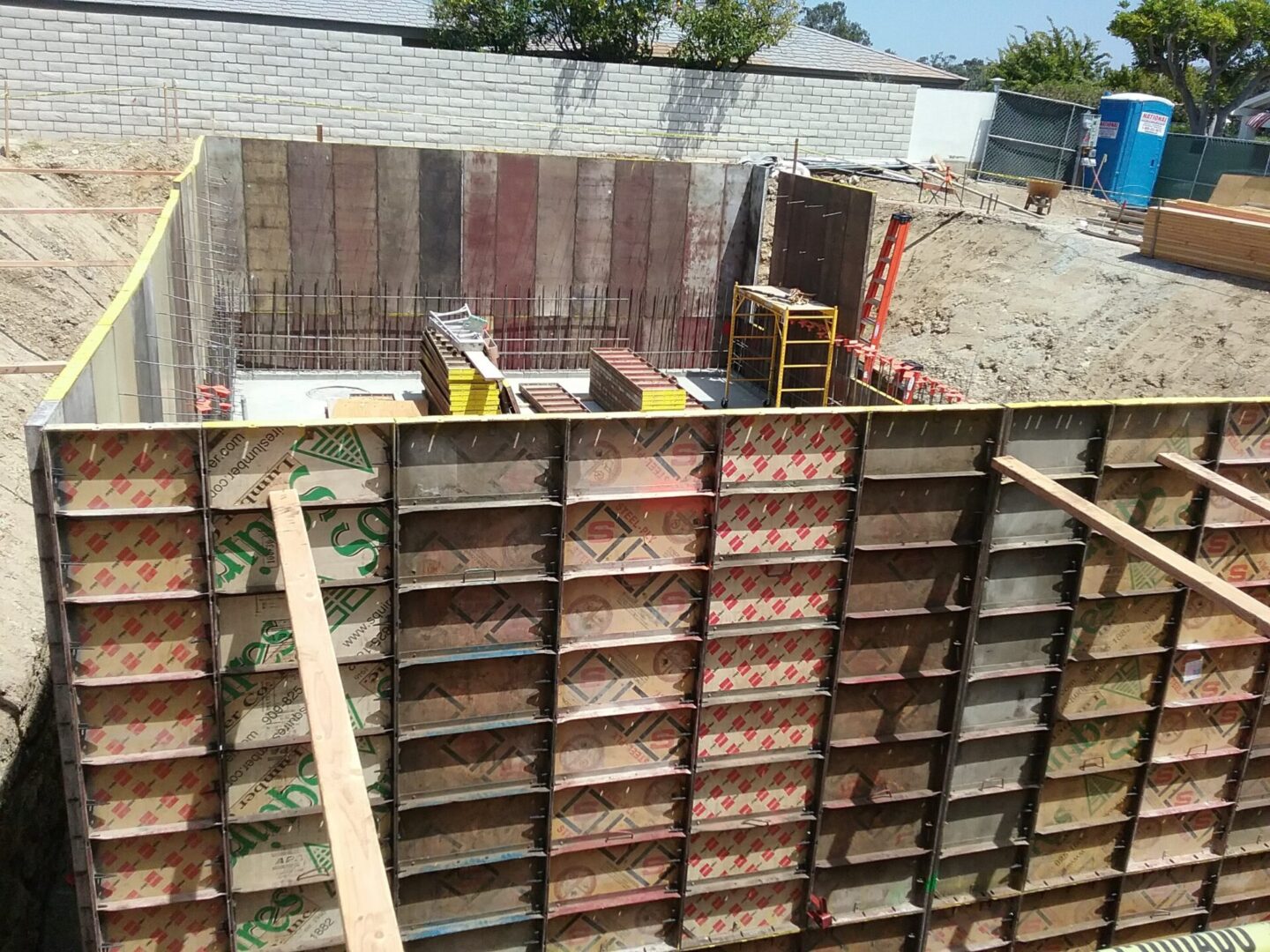 A building with some wooden blocks on top of it