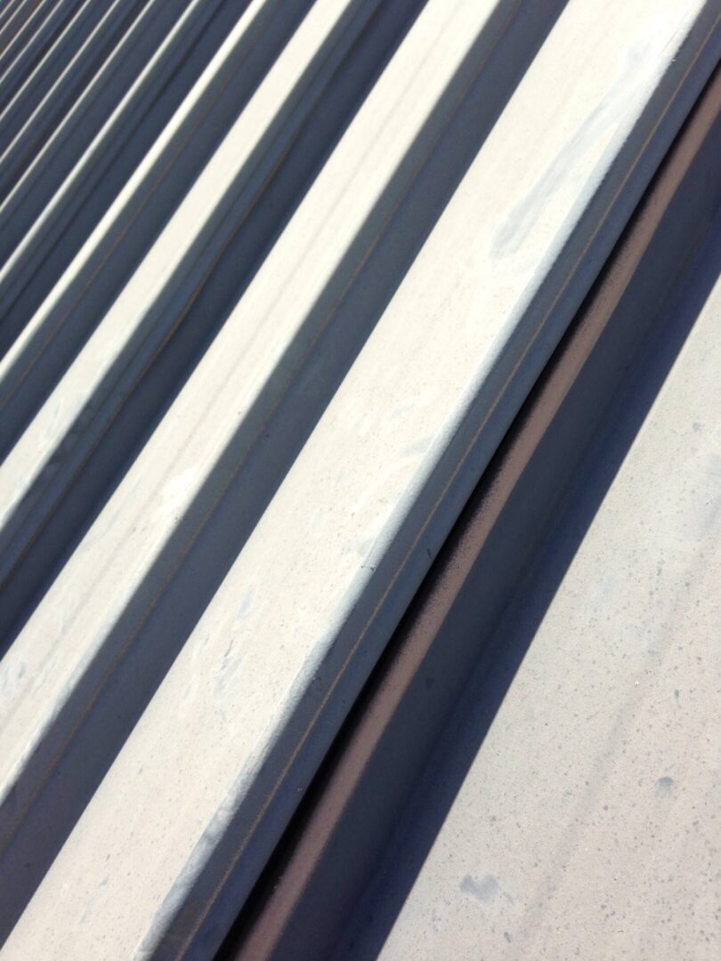 A close up of the metal roof on a building.