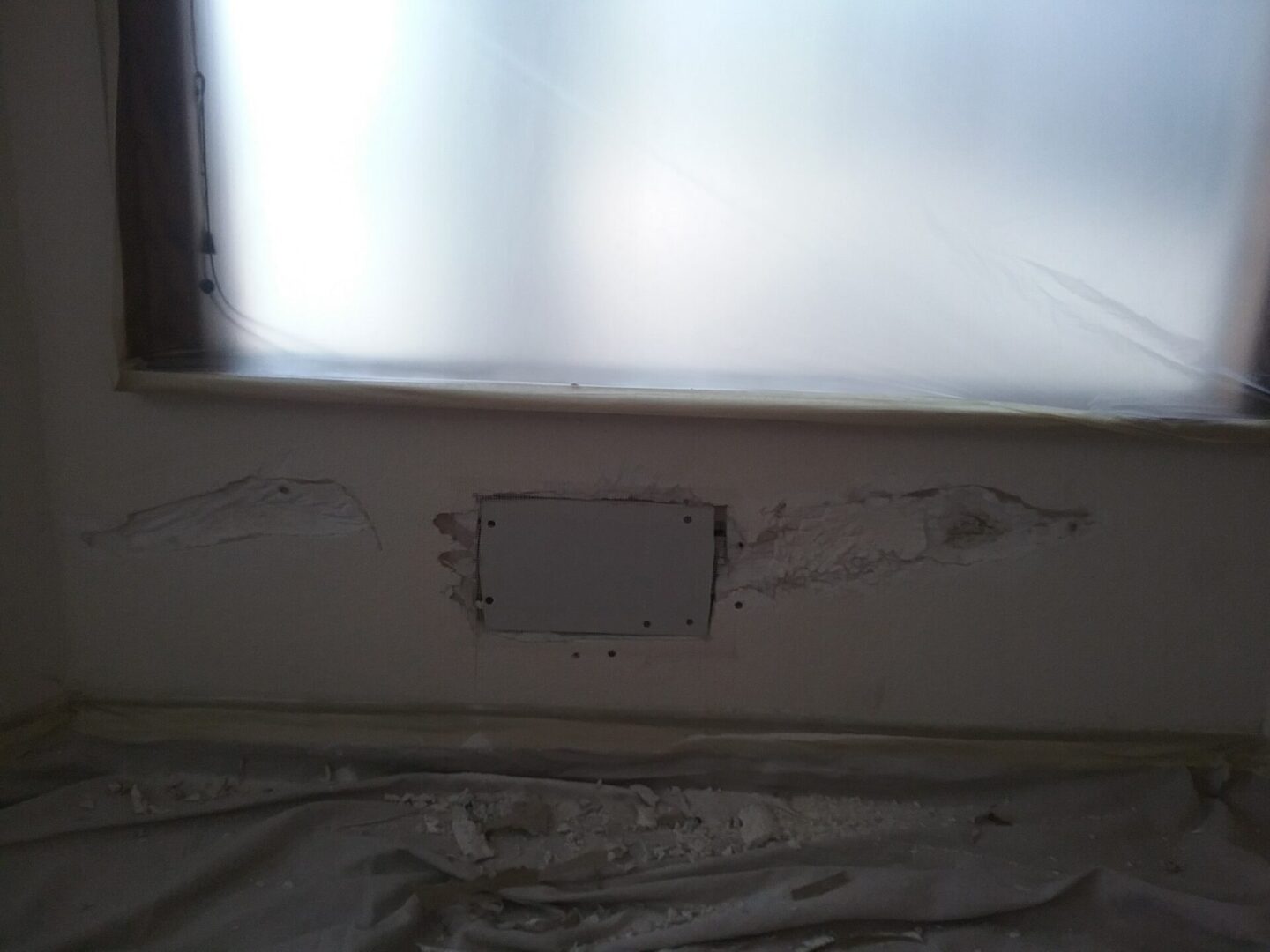 A window sill with some plaster on it