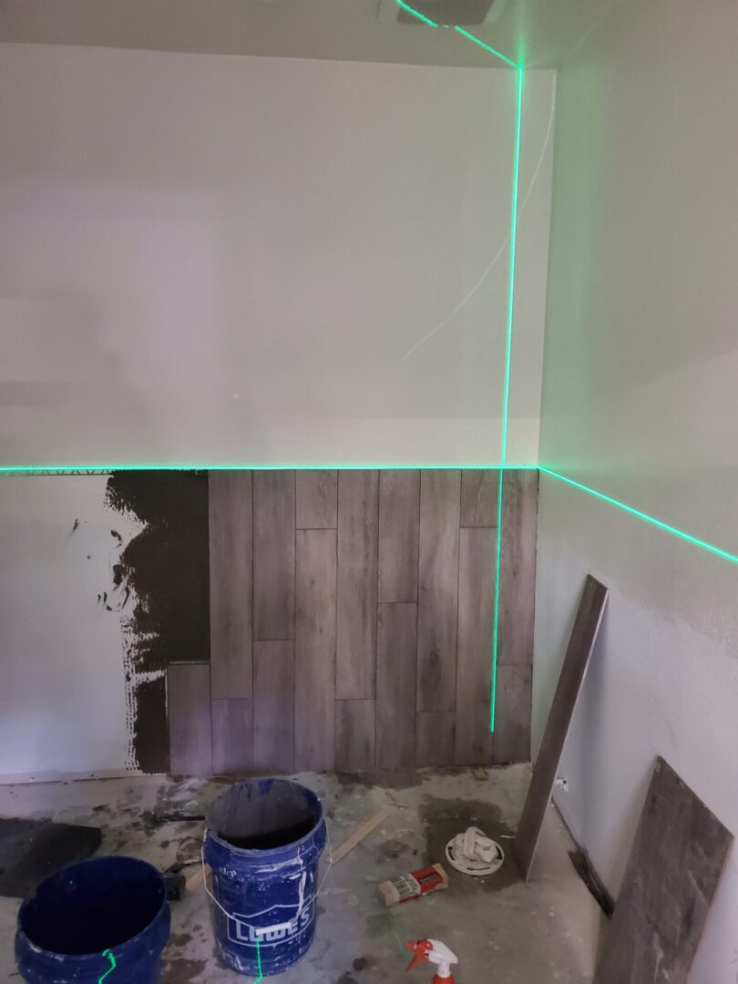 A room with green lights on the wall.