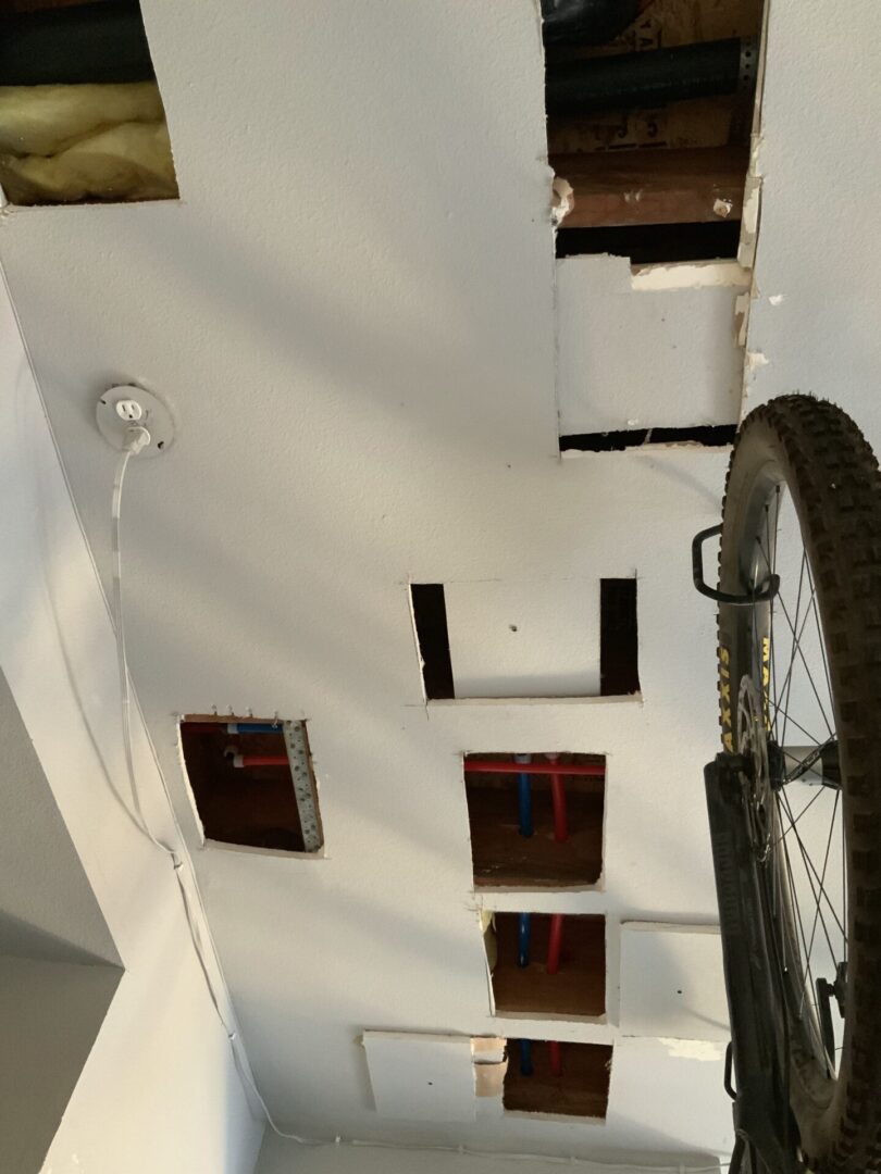 A bicycle tire in the middle of a room.