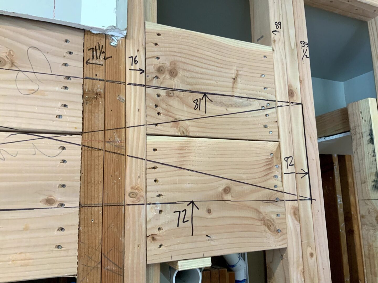 A wooden structure with some numbers on it