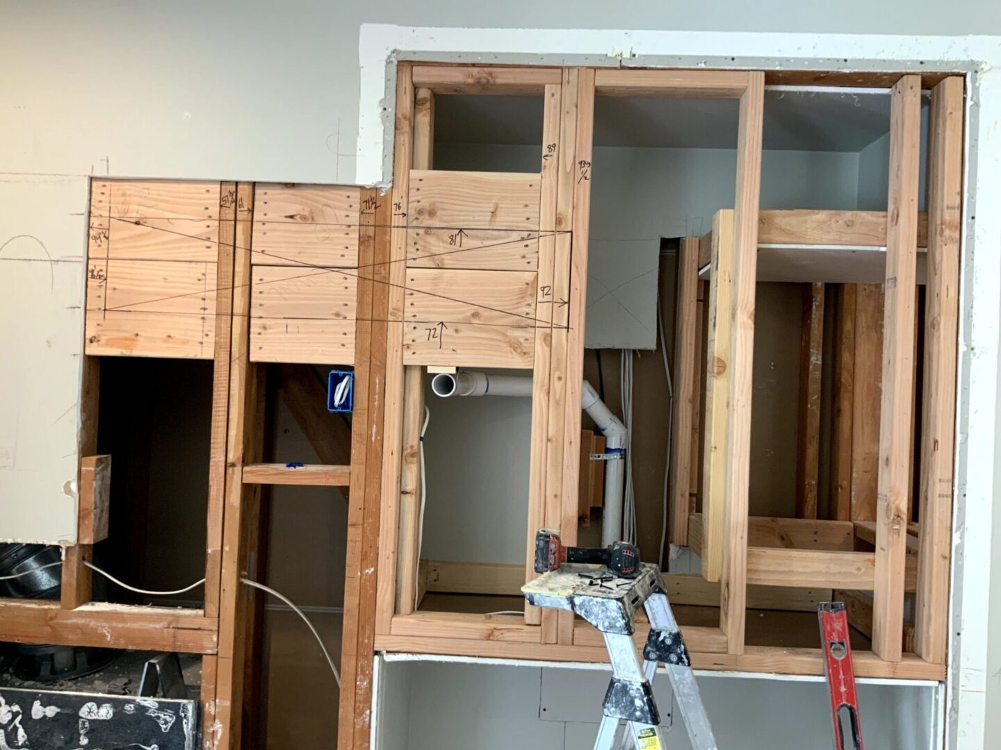 A room being built with wood and metal.