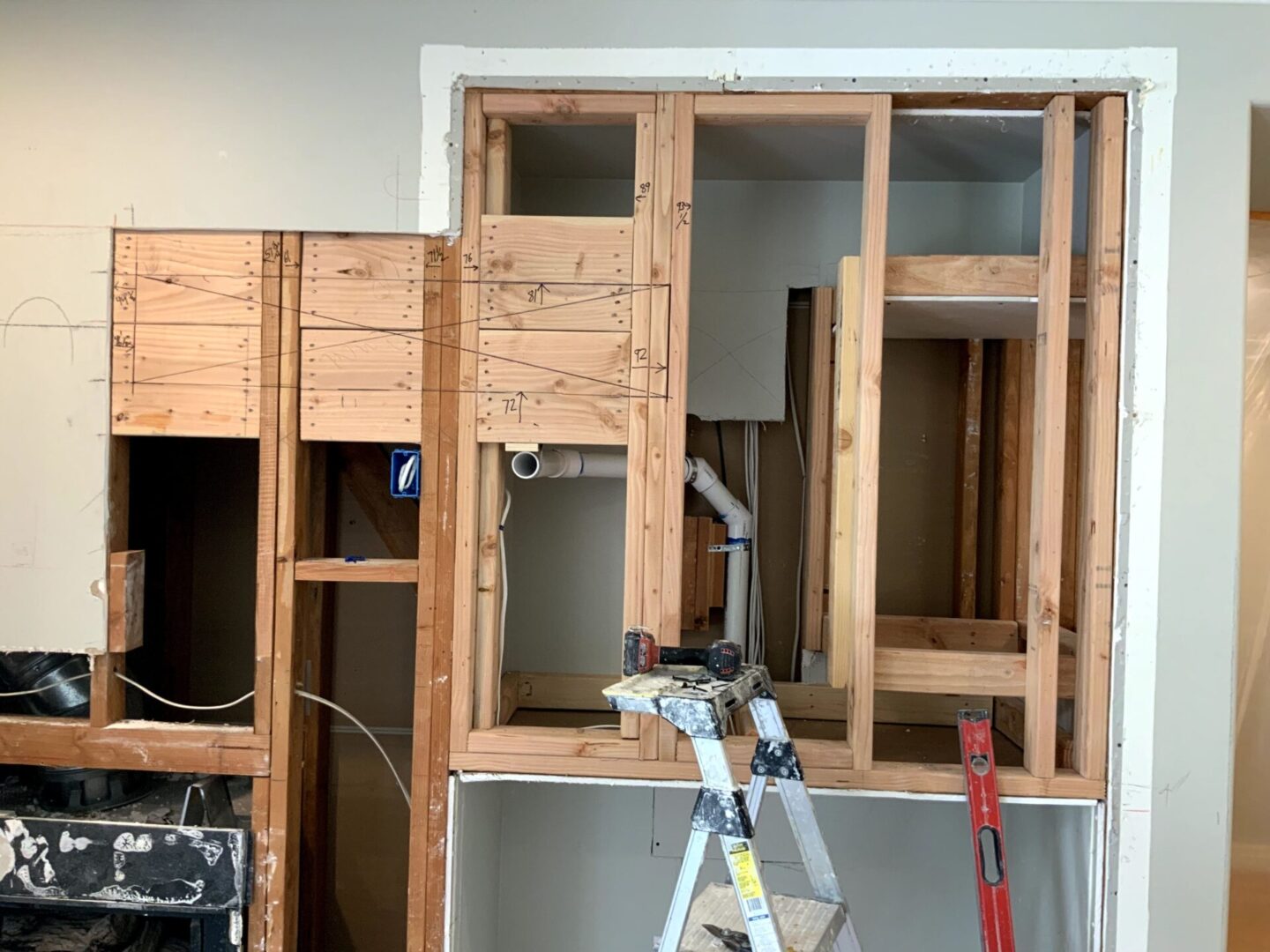 A room being built with wood and metal framing.