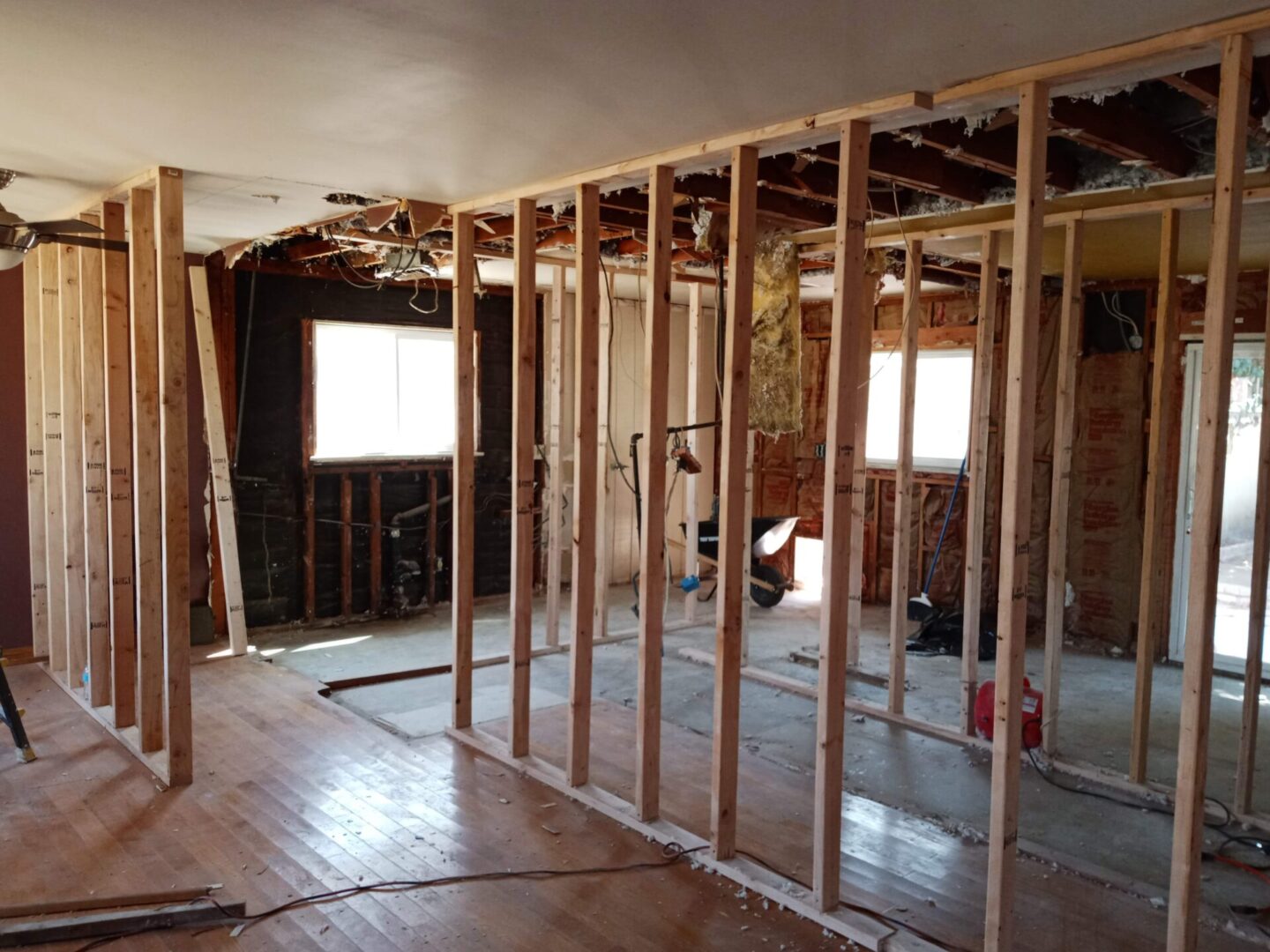 A room being remodeled with wood framing and construction.