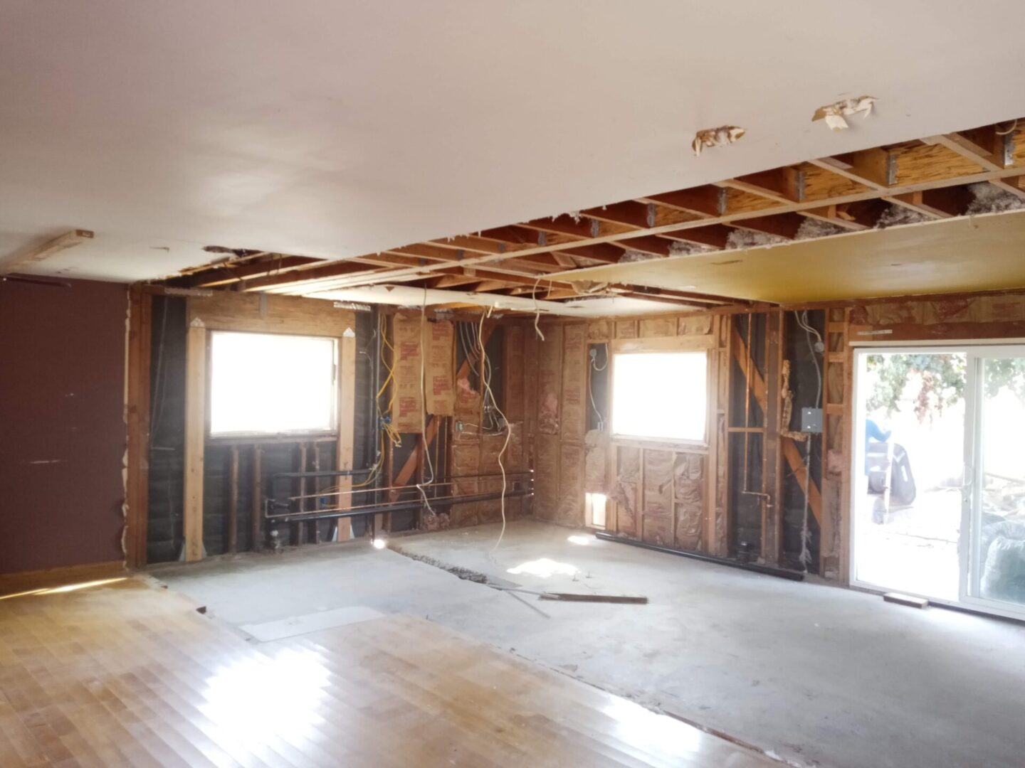 A room with wood floors and walls in it