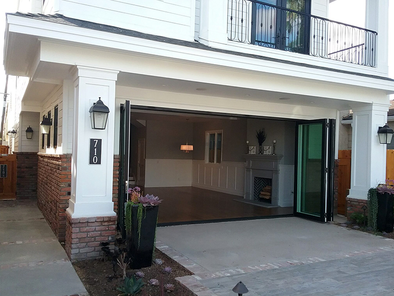 A garage door opened up to show the outside.