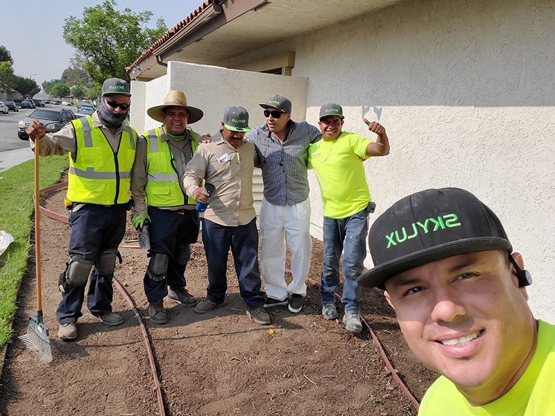 A group of men standing next to each other.