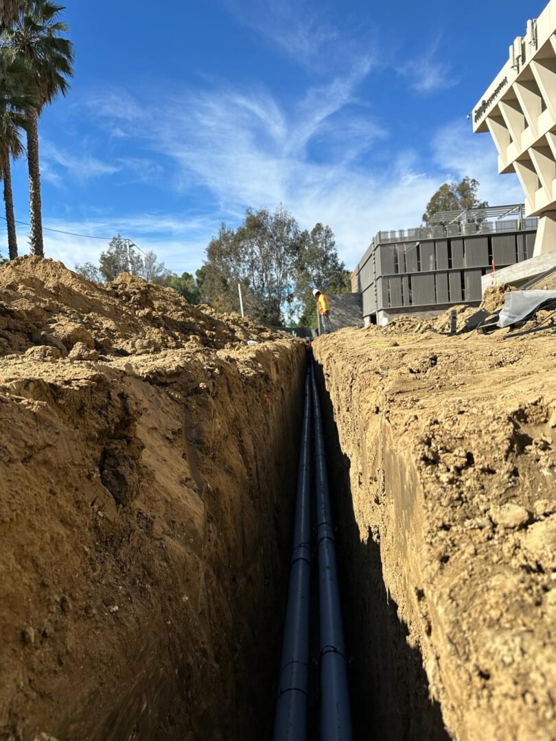 A view of a trench with water coming out.