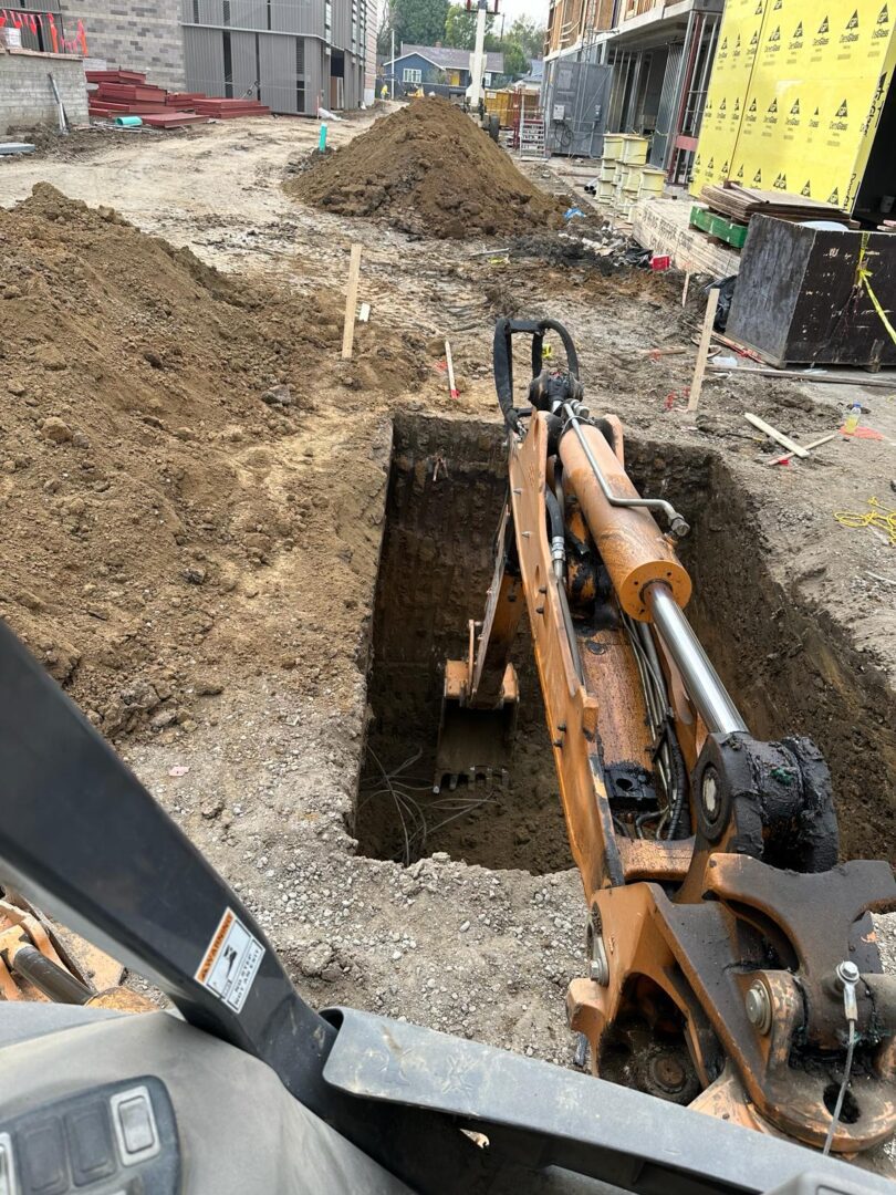 A construction site with a shovel and a machine.